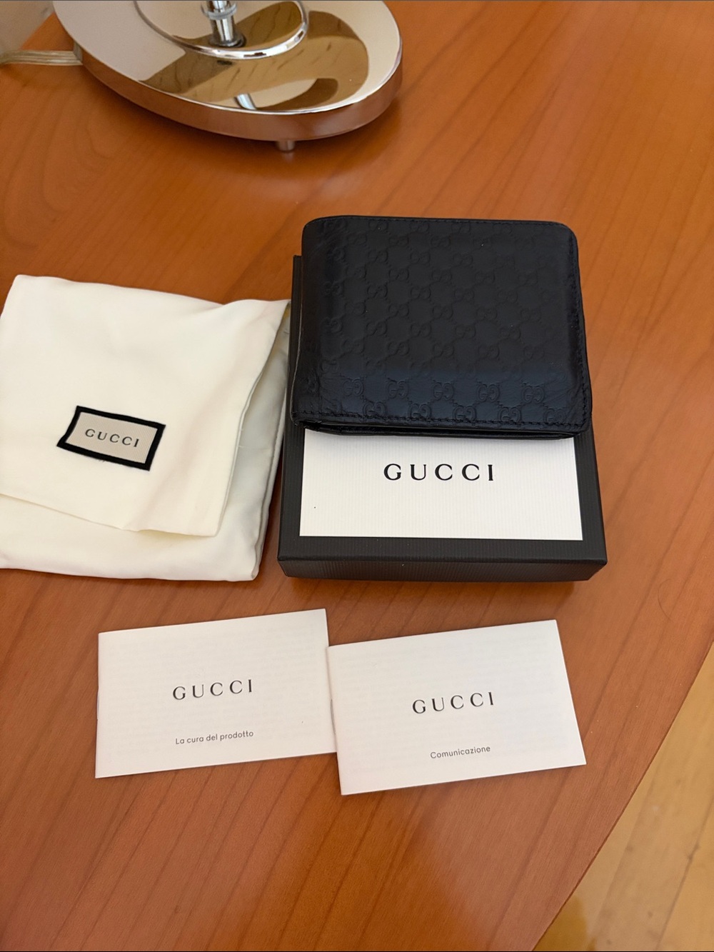 Gucci DARK BLUE Embossed Leather Bi-Fold Wallet with Logo Pattern